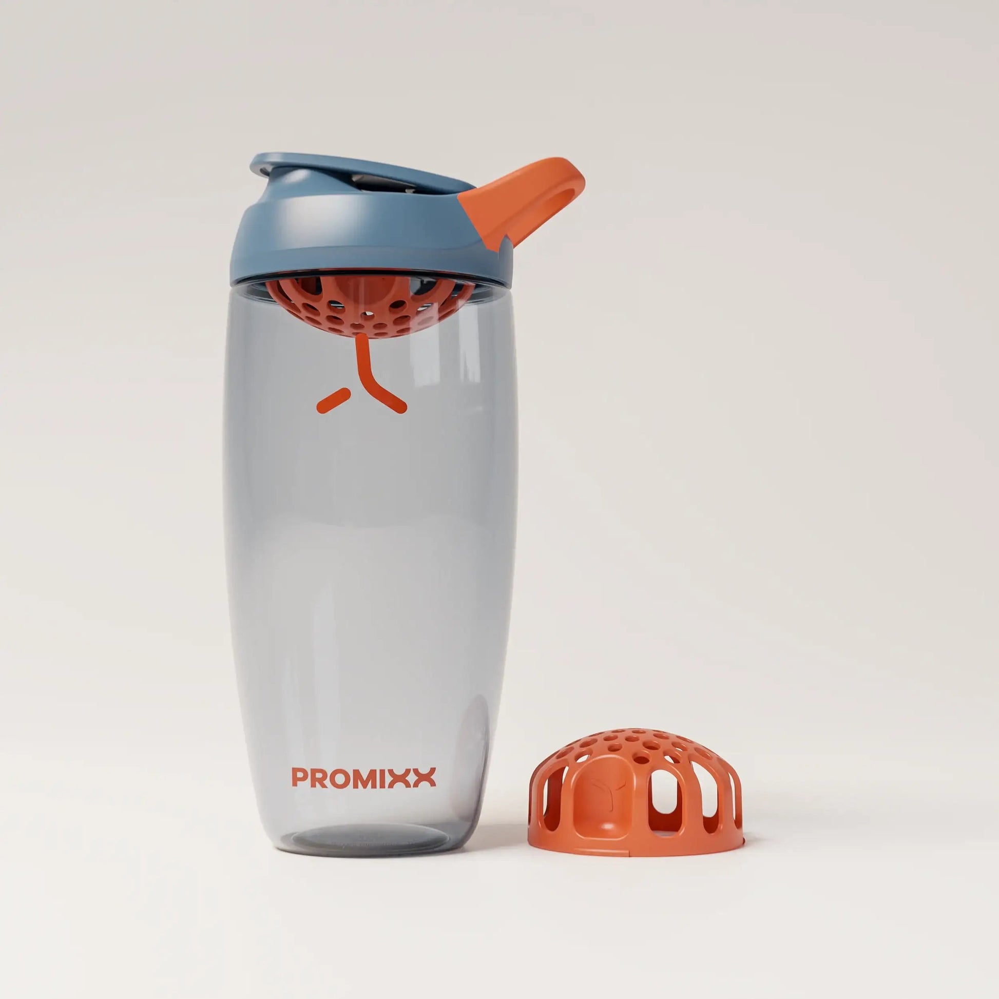 ecozen-performance-shaker-bottle-g4 SHKR_24700_P-S1_heroAgitatorFloor_midnightBlue_burntOrange_1_1_hero_edit_f37f5a2f-8cd4-4264-9ff5-4468aea63a90.png